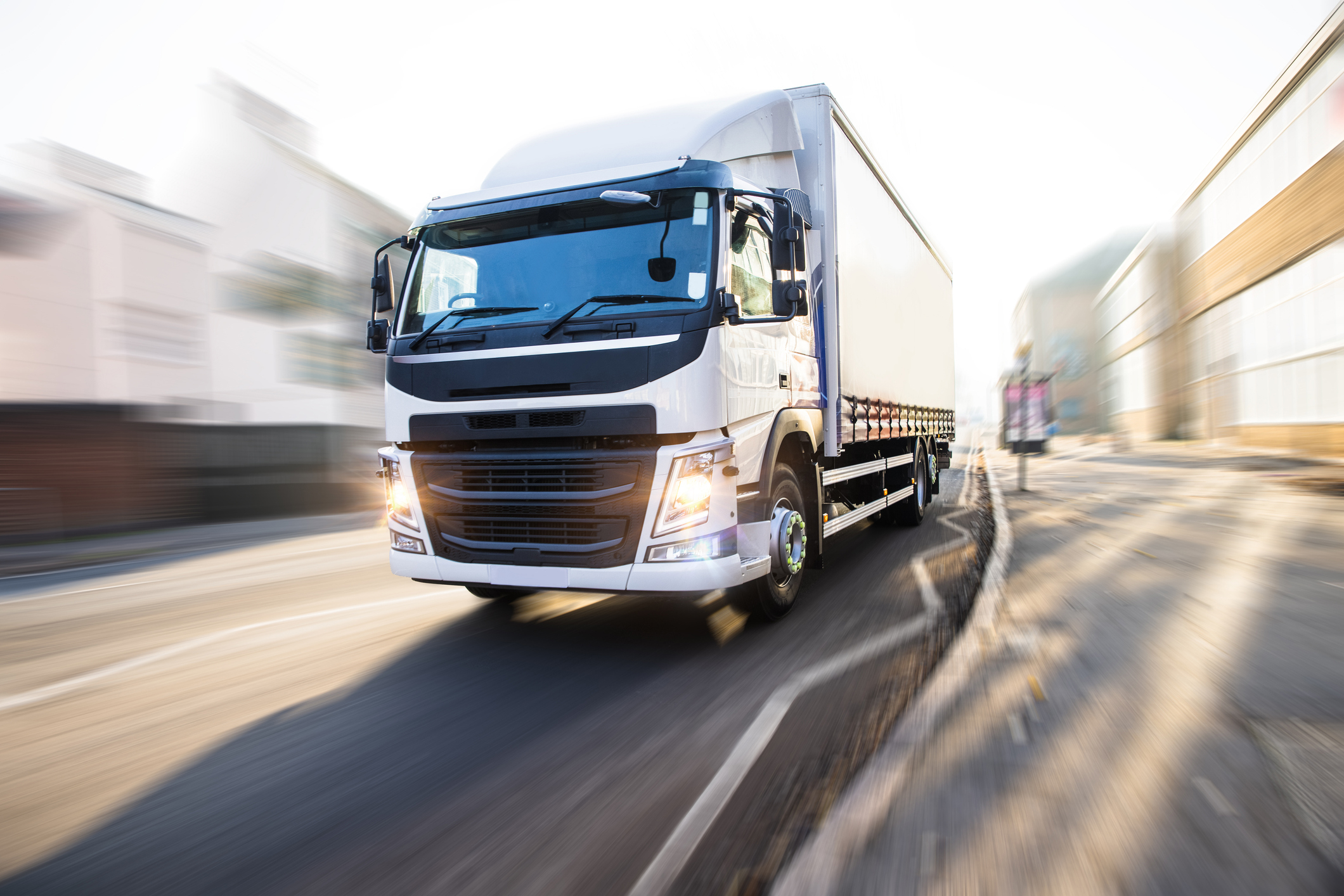 Convoy of MAN trucks on the country road